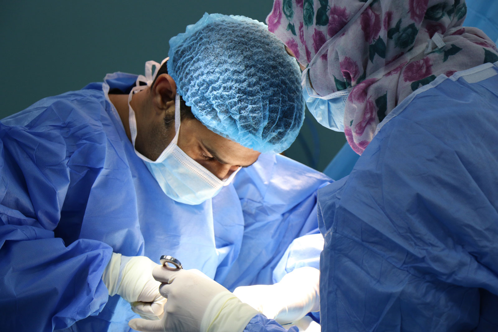 Doctors having operation